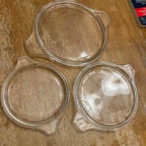 Vintage Pyrex lids for casserole bowls.